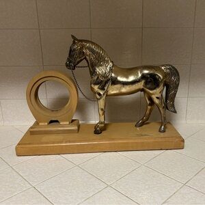 Elegant Gold Horse Sculpture